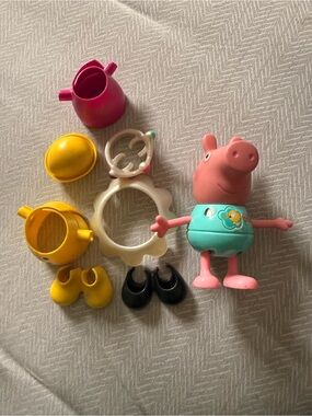 Peppa Pig Pink & Teal Figure with Yellow Accessories